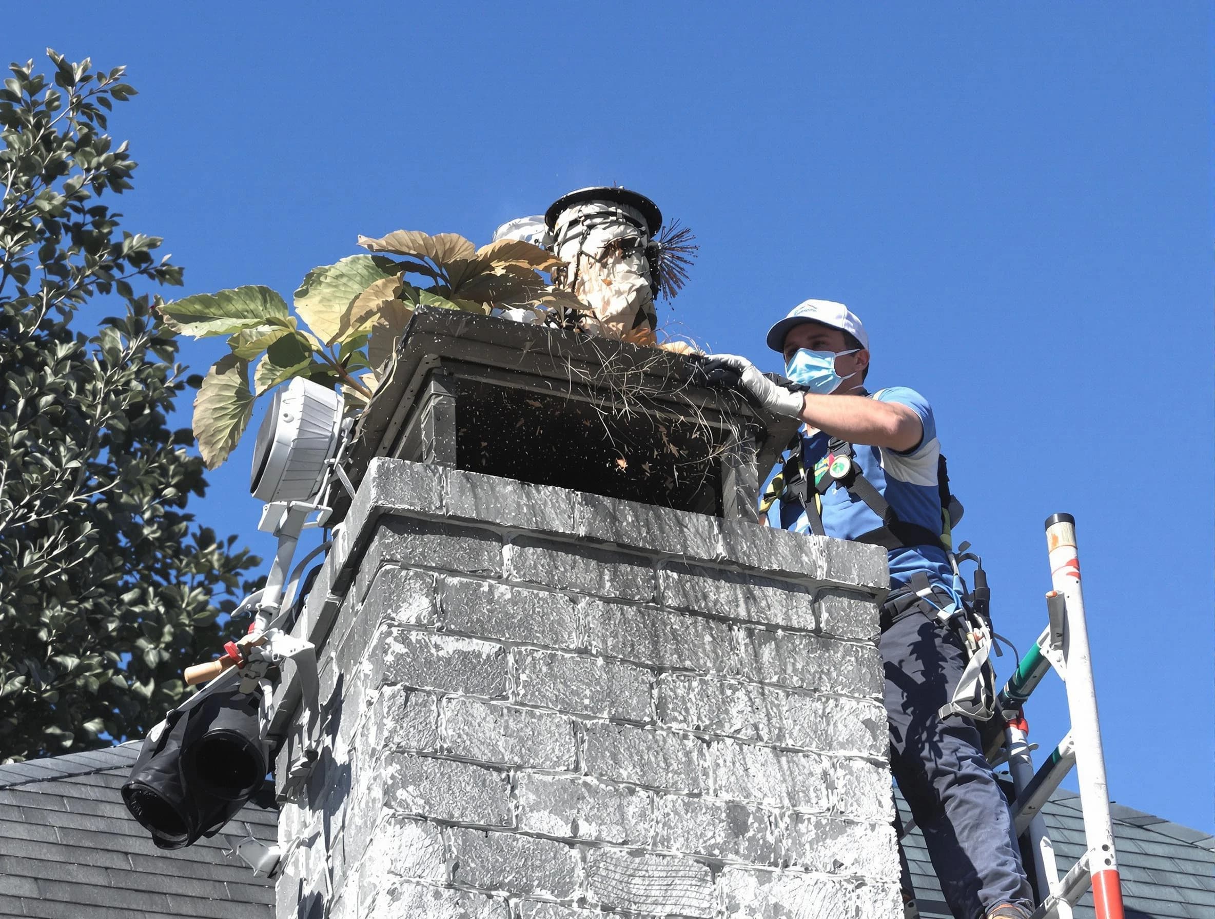 Franklin Chimney Sweep specialist performing chimney cleaning in Franklin, NJ